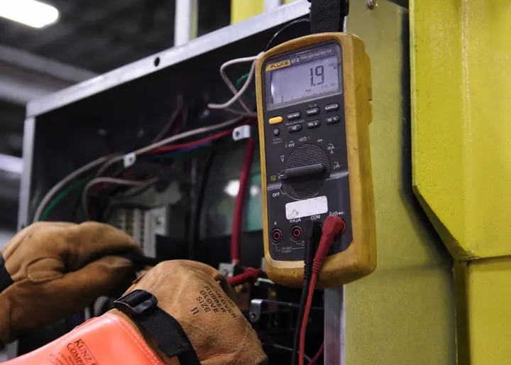 Commercial electricians working on site