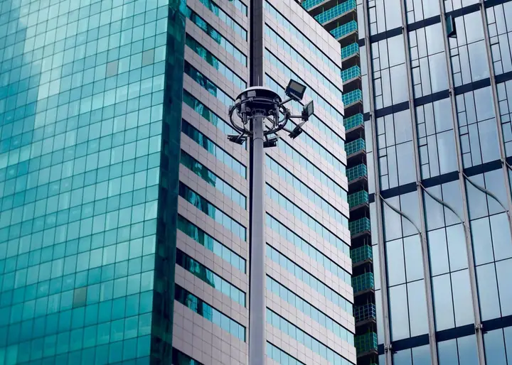 Security guard standing watch in a commercial office lobby entrance