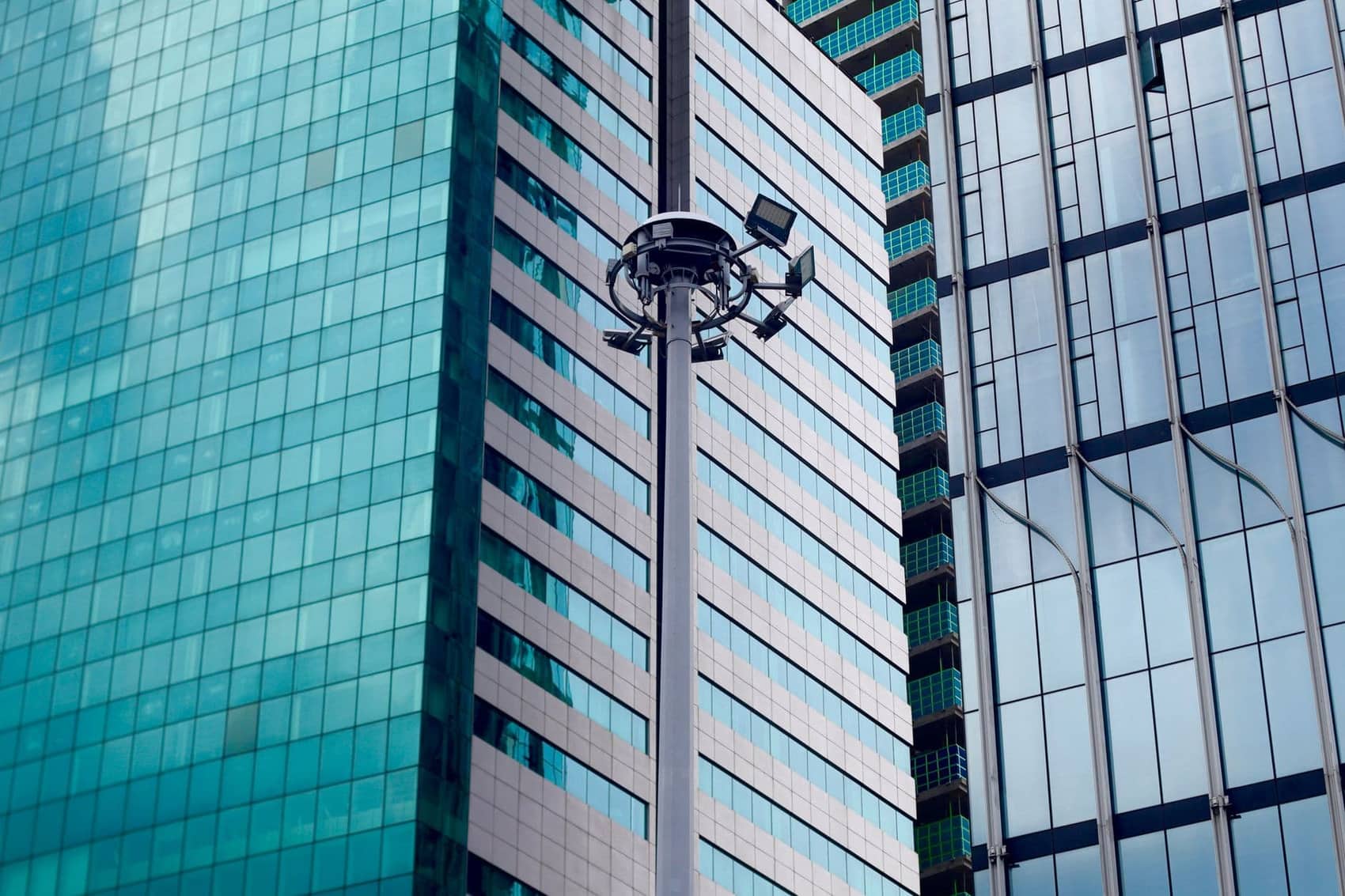 Security guard standing watch in a commercial office lobby entrance