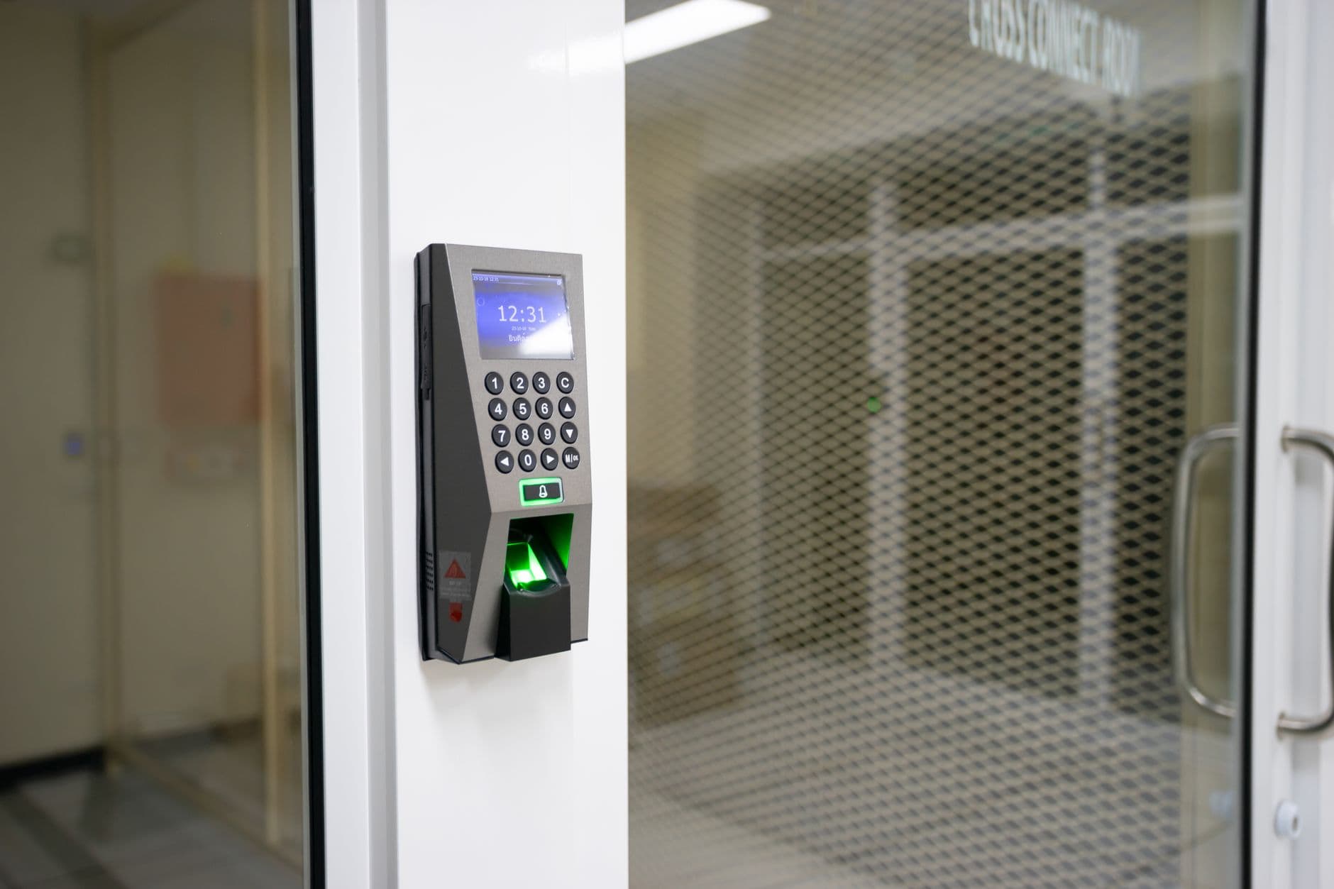 Uniformed security guard monitoring a corporate building entrance